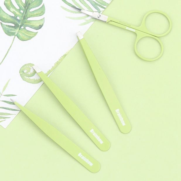 a set of tweezers with scissors